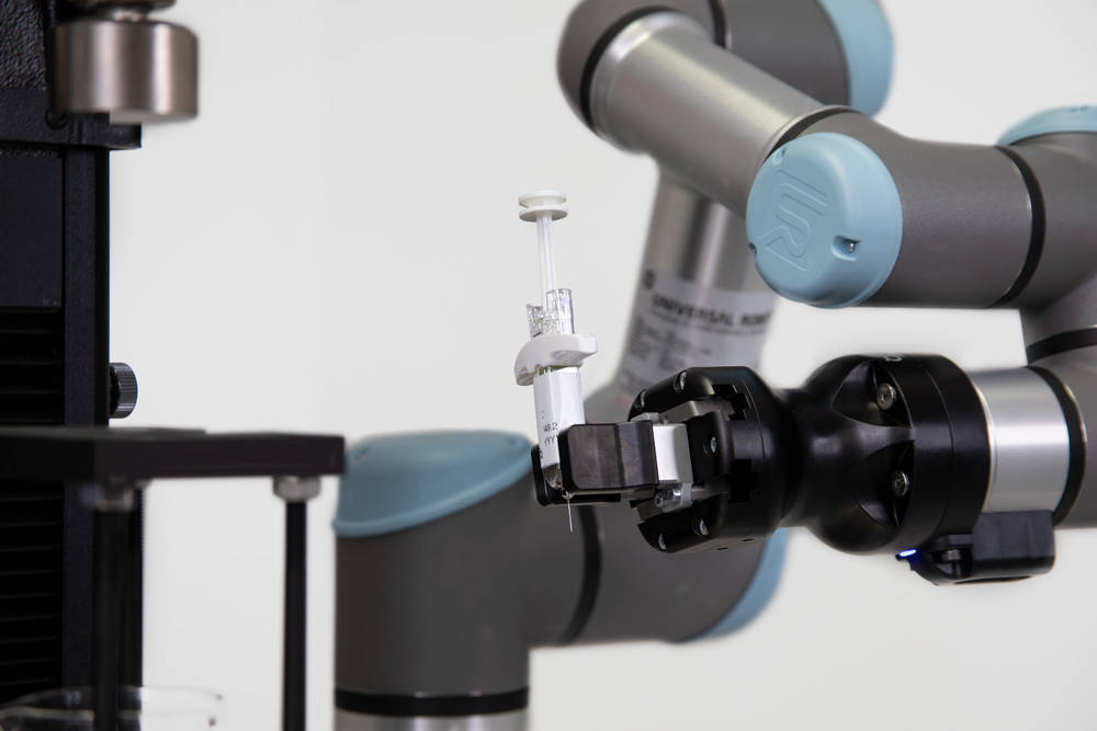 Syringe Testing with a Cobot