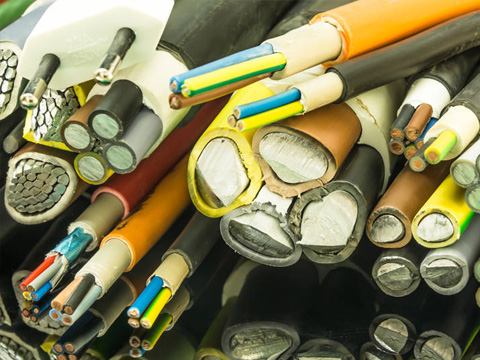 Close-up of a bundle of assorted pencils, including wooden and colored pencils, with sharpened tips and eraser ends.