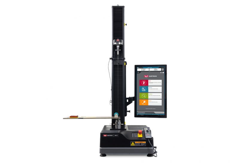 Instron 68SC-5 single column universal testing system configured with a ASTM D1894 / ISO 8295 coefficient of friction fixture and horizontal test platform, with the Bluehill Universal software displaying the test navigation interface.