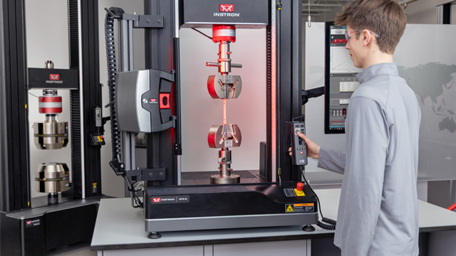 | Instron Instron 68TM Universal Testing System 68FM in background