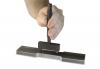 Manual gauge point punch in use