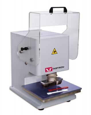 Specimen punching machine
